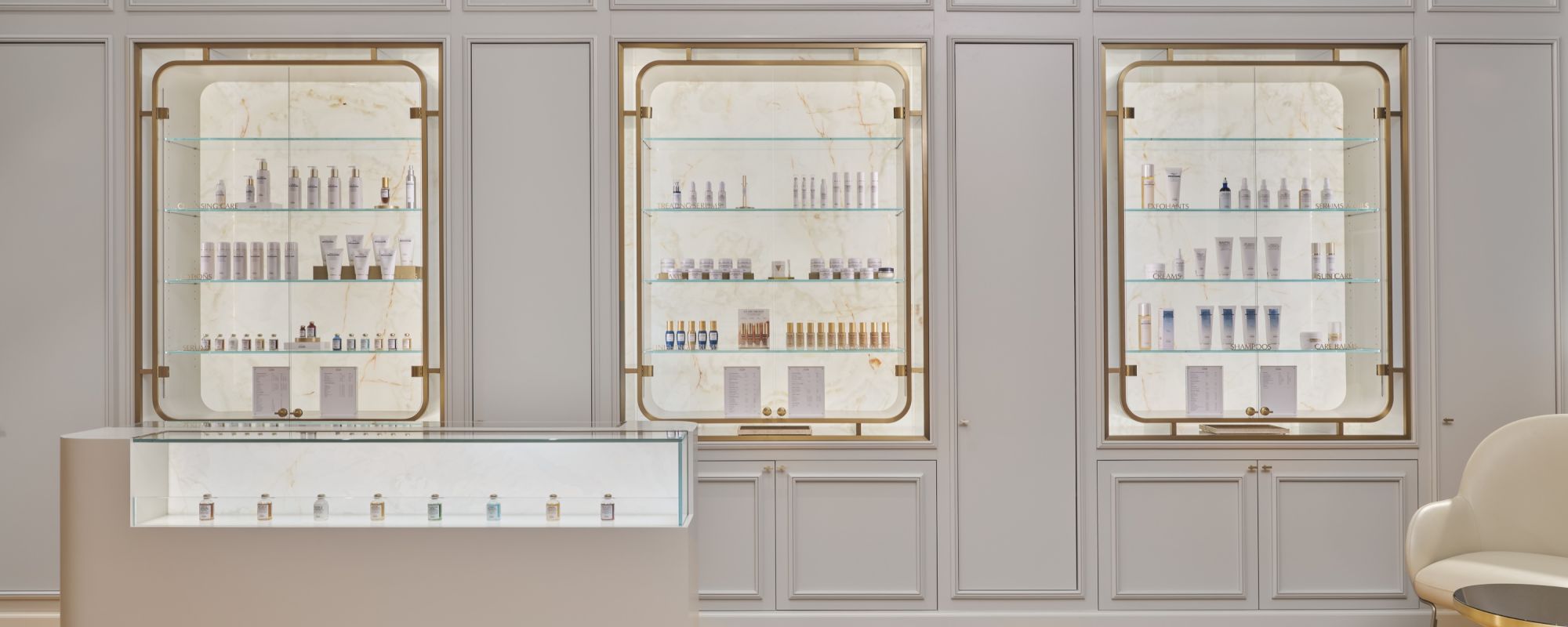 A modern store interior with products displayed on shelves.