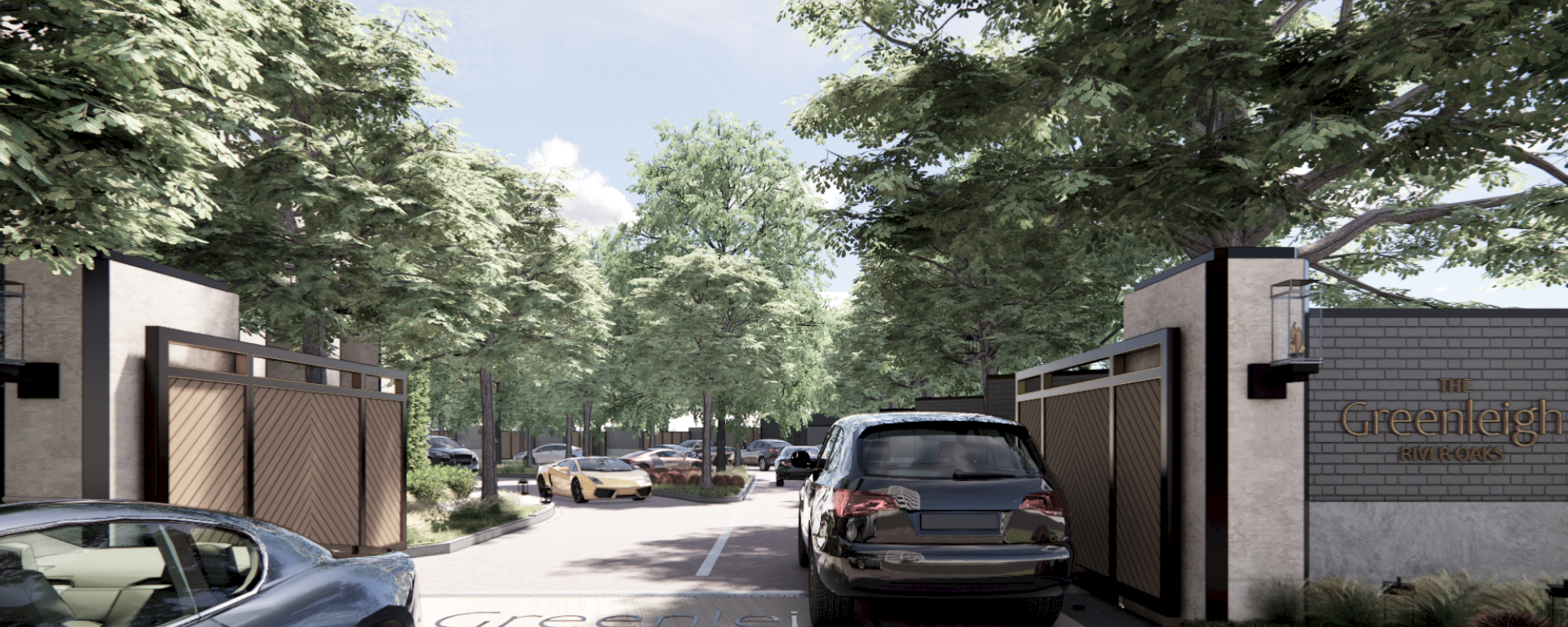 Gated entrance with cars and trees around it.